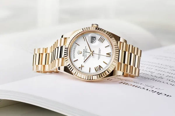 Rolex Day-Date 40 Presidential White dial, Fluted Bezel, President bracelet, Yellow gold Watch